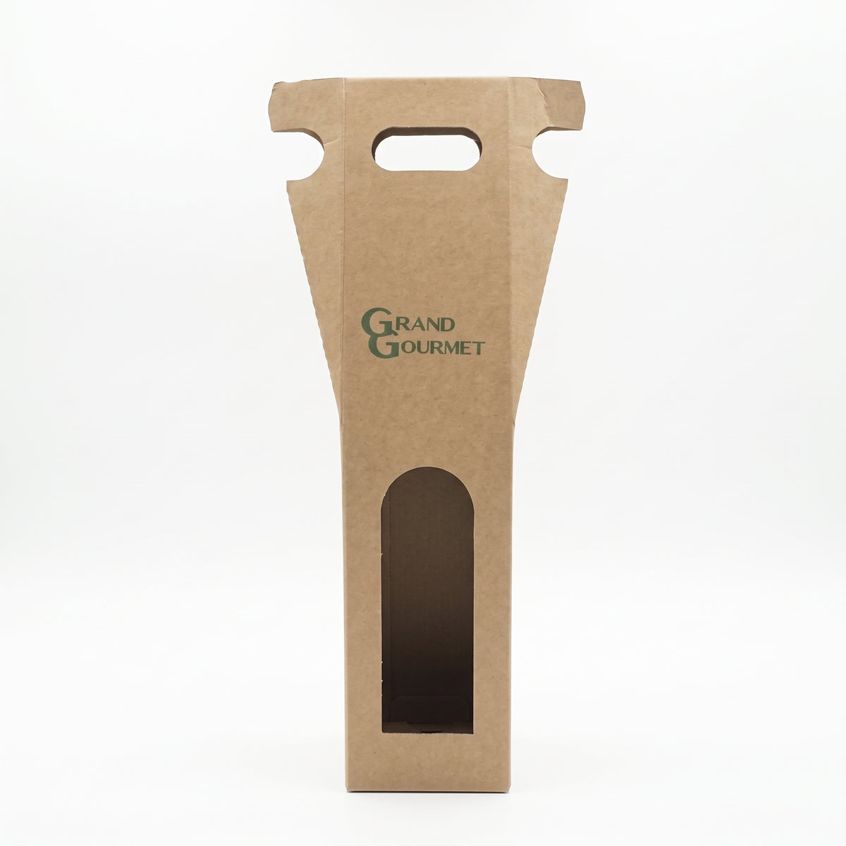 Rigid kraft cardboard single-bottle packaging featuring an integrated carrying handle for easy transport. Designed with a front die-cut window to showcase the label of a wine, spirit, or gourmet oil bottle.