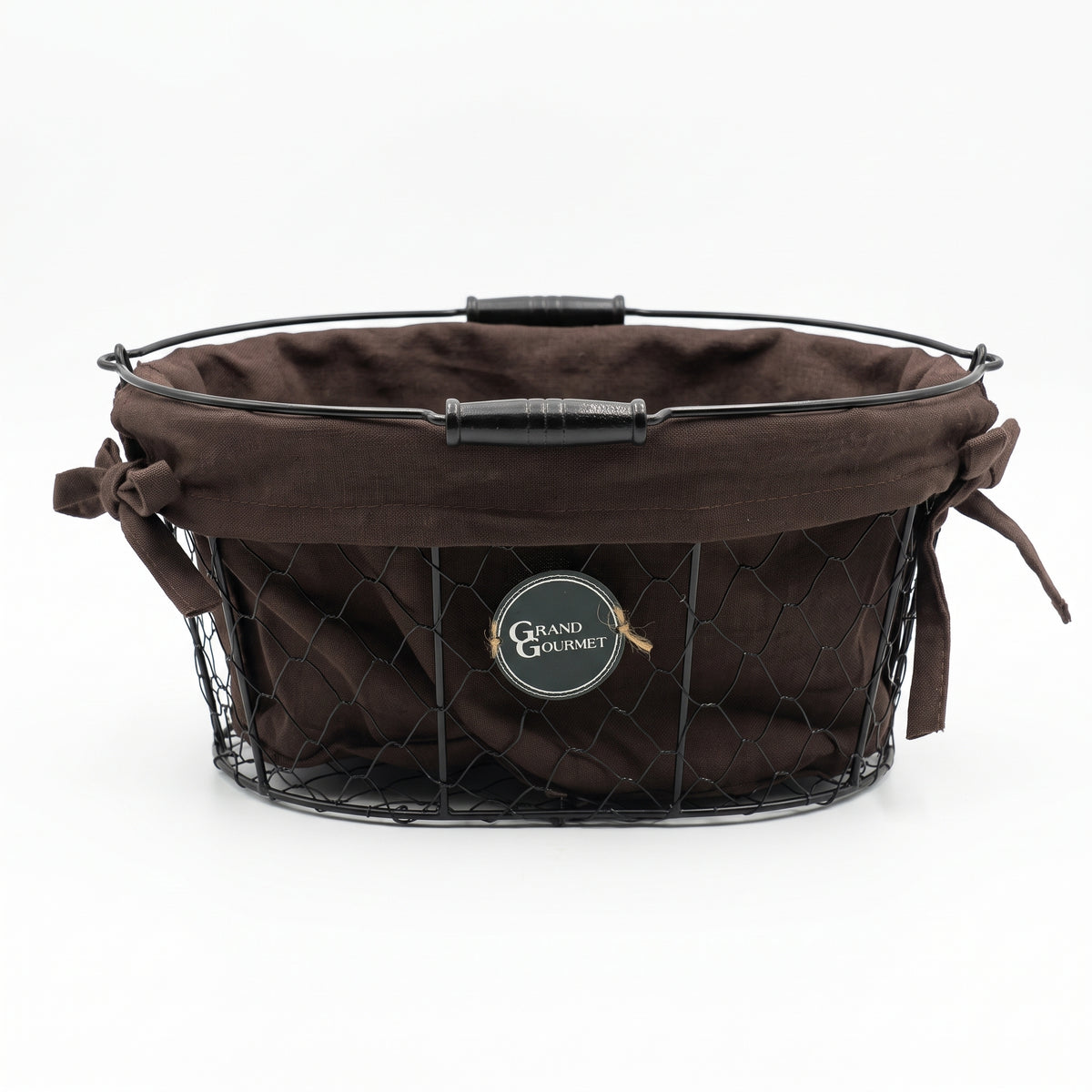 Metal wire display basket featuring a removable interior fabric liner and dual handles for easy carrying. Designed to hold, arrange, and present gourmet goods, bread, fruits, or gift sets.